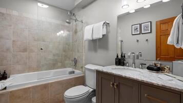 Cornet Creek Bathroom - Shower/tub combo with single vanity and grown alchemist products