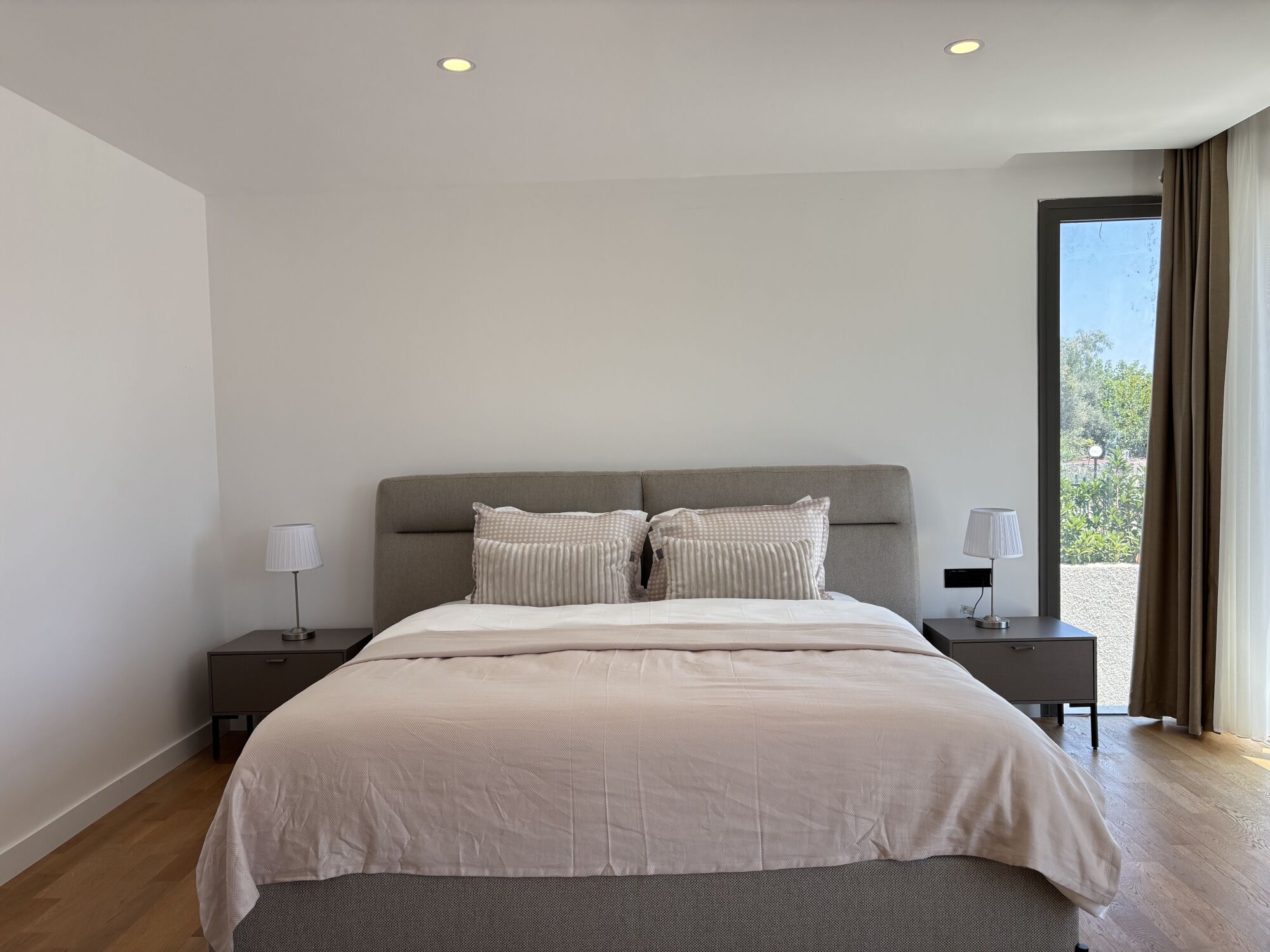 Desk, iron/ironing board, bed sheets