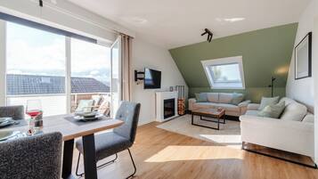 Smart-TV, Kamin, Stereoanlage