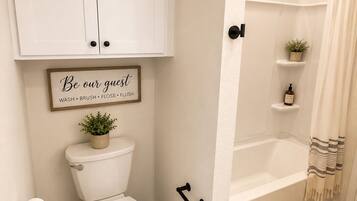 Hair dryer, towels, soap, toilet paper