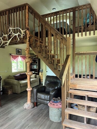 Retreat to this quiet 1 bedroom cabin in the woods near a lake.