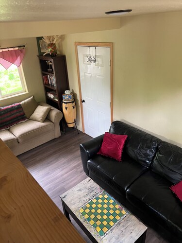 Retreat to this quiet 1 bedroom cabin in the woods near a lake.