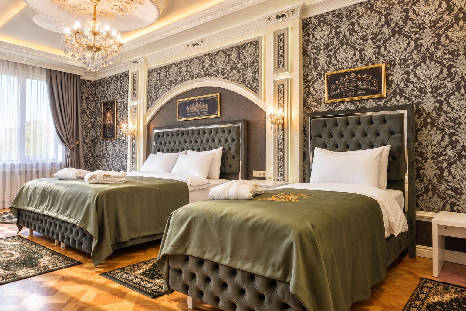 A hotel room with two beds, ornate wallpaper, a chandelier, and a sign reading 'Imperial Hotel.'