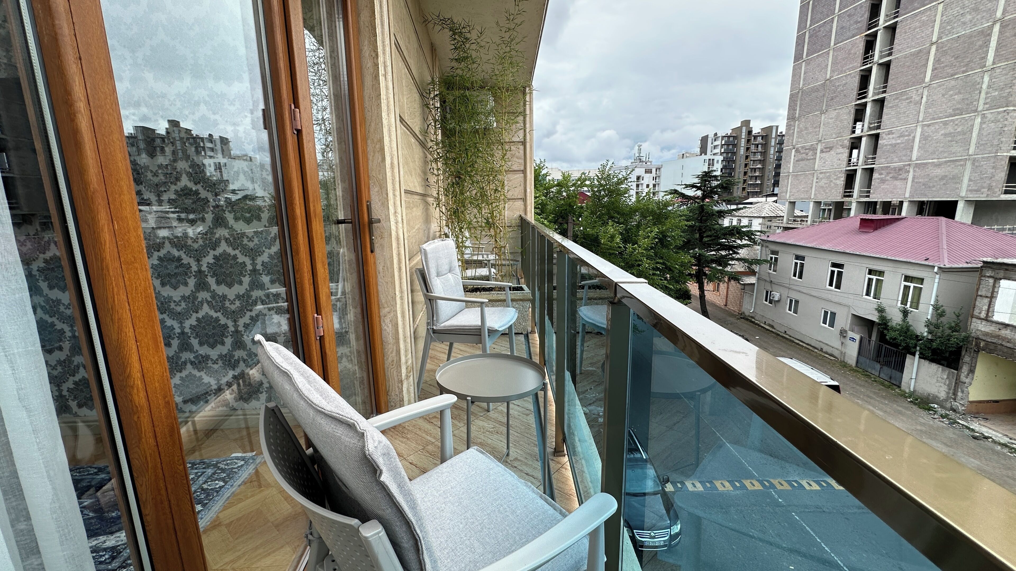 Quarto luxo, vista para a cidade, no canto | Sacada