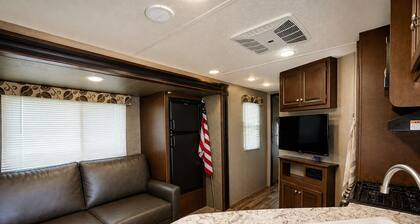 Modern RV on the shores of Maria Lake.
