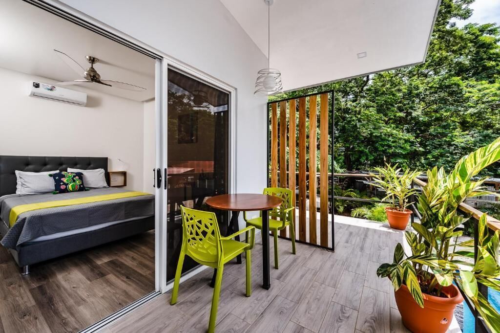 Deluxe Double Room, Balcony, Pool View | Outdoor dining