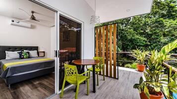 Deluxe Double Room, Balcony, Pool View | Outdoor dining