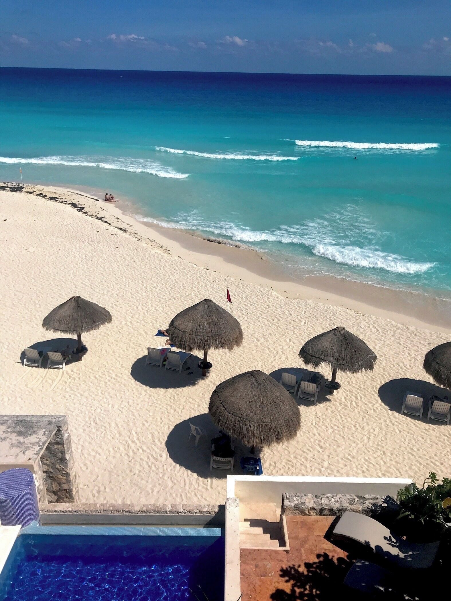 On the beach, sun loungers, beach towels