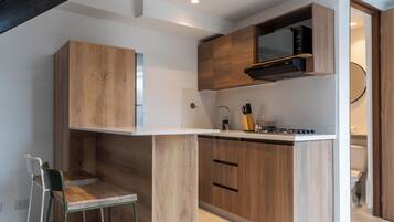 Basic Apartment | Living area | 32-inch LCD TV with cable channels