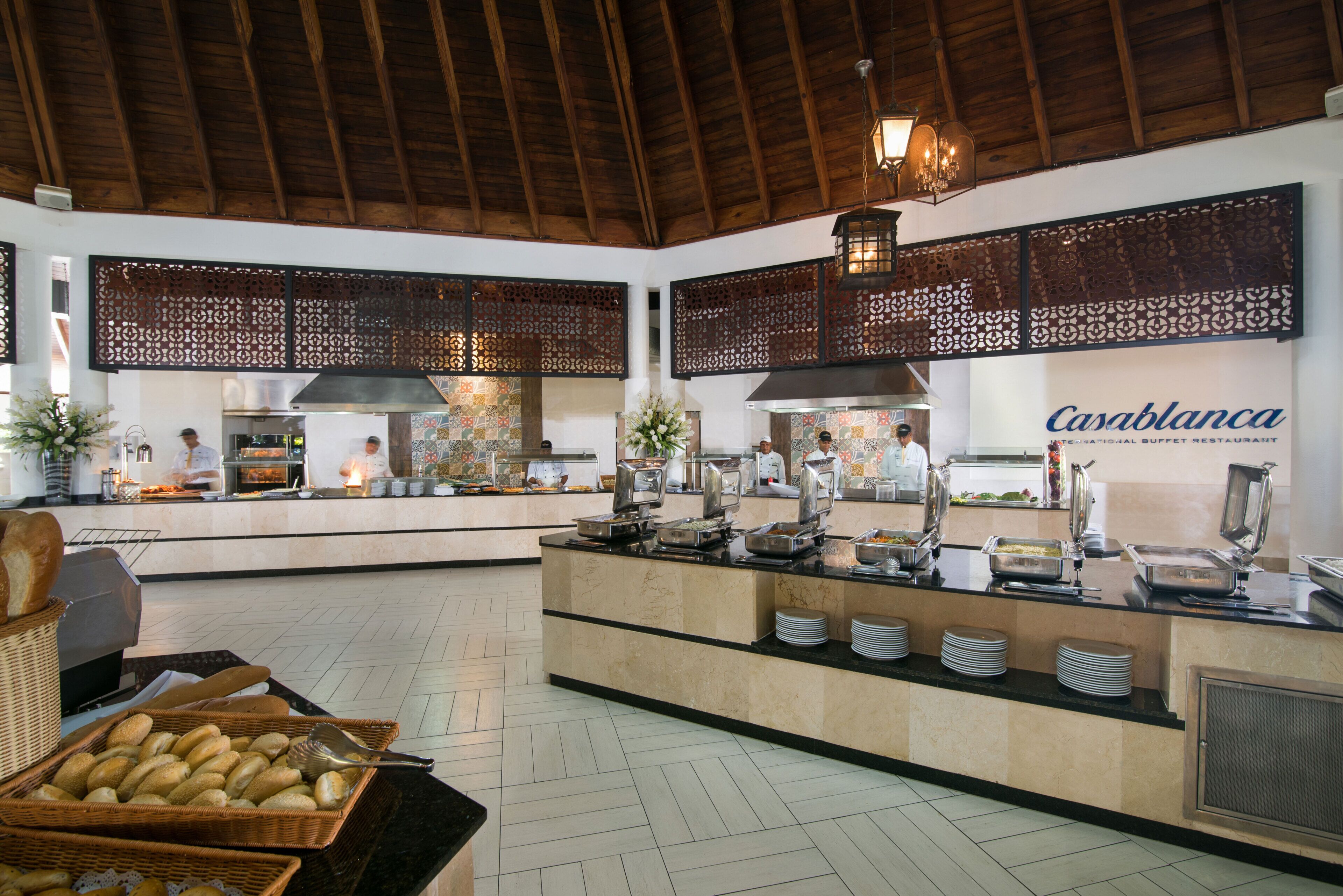 A buffet area with a wooden ceiling, decorative panels, and a sign for 'Casablanca.'