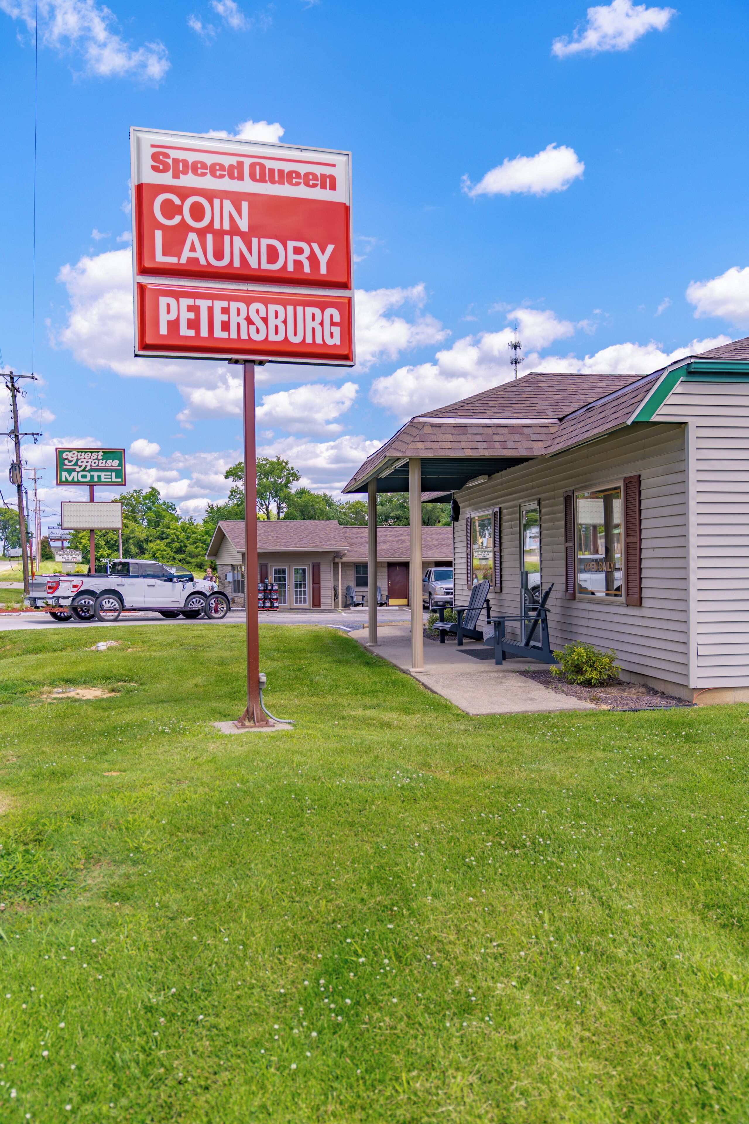 A coin laundry with a sign indicating it's in Petersburg.