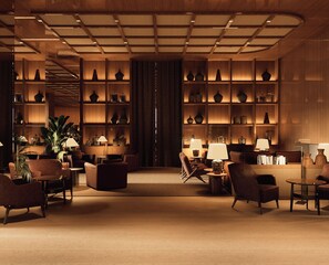 A spacious living room with a large bookshelf, comfortable seating, and a warm ambiance. - Fasano Peninsula (Punta del Este)