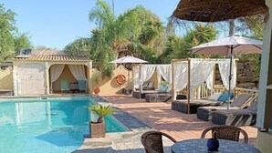 Outdoor pool, open 8:30 AM to 8:30 PM, pool umbrellas, sun loungers