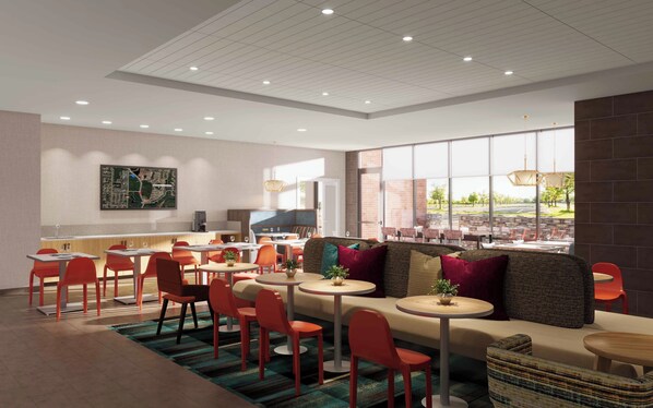 A modern dining area with red chairs, round tables, and a large window offering a view of the outdoors. - Home2 Suites By Hilton Barrie (Barrie)