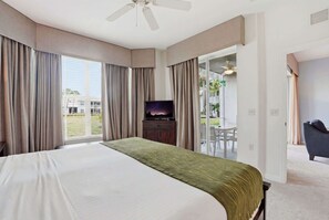 A hotel room with a large bed, a television, and a view of the outdoors. - 414 -Wheelchair Accessible - Sleeps 6 (Naples)