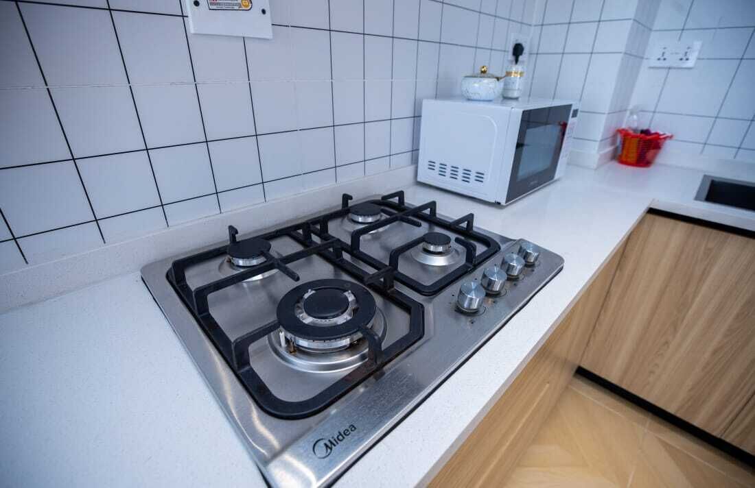Deluxe Apartment, Pool View | Private kitchen | Full-size fridge, microwave, oven, stovetop