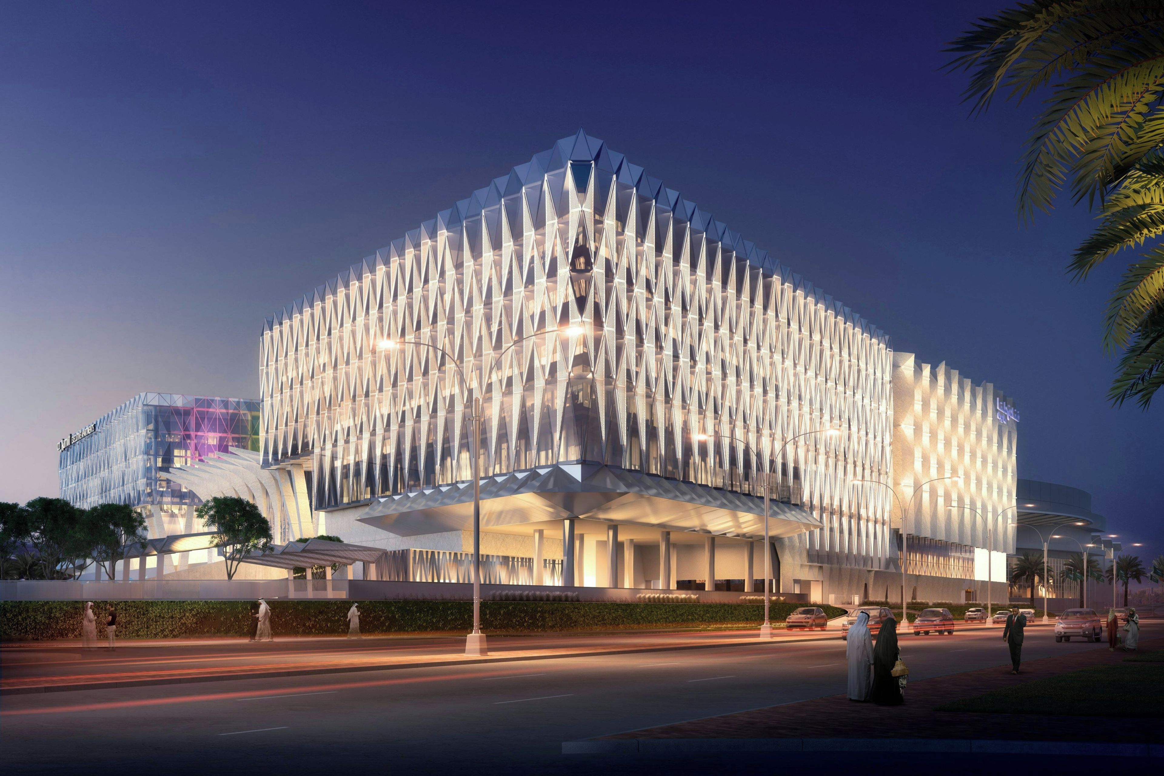 A modern building with a unique geometric facade and a covered entrance area.