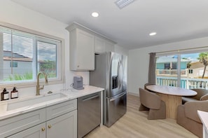 Microwave, dishwasher - Coastal 2BR Beach Getaway | Gulf + Bay | Unit B (Manasota Key)
