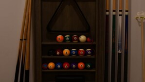 A wooden rack holding pool cues and billiard balls. - Kozy KanataTremblant (261) (Amherst)