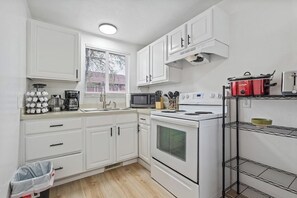 Coffee/tea maker, fridge, microwave, oven