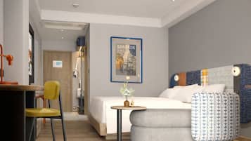 A modern hotel room with a bed, a desk, a chair, and a small table with a vase.