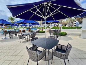 Outdoor dining - Exceptional waterfront 3 bedroom apartment at JW Marriott (Oyster pond)