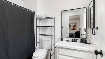 Hair dryer, towels, soap, toilet paper