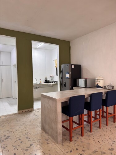 El Platanar Green House with a Tropical Garden in the Heart of Calkiní