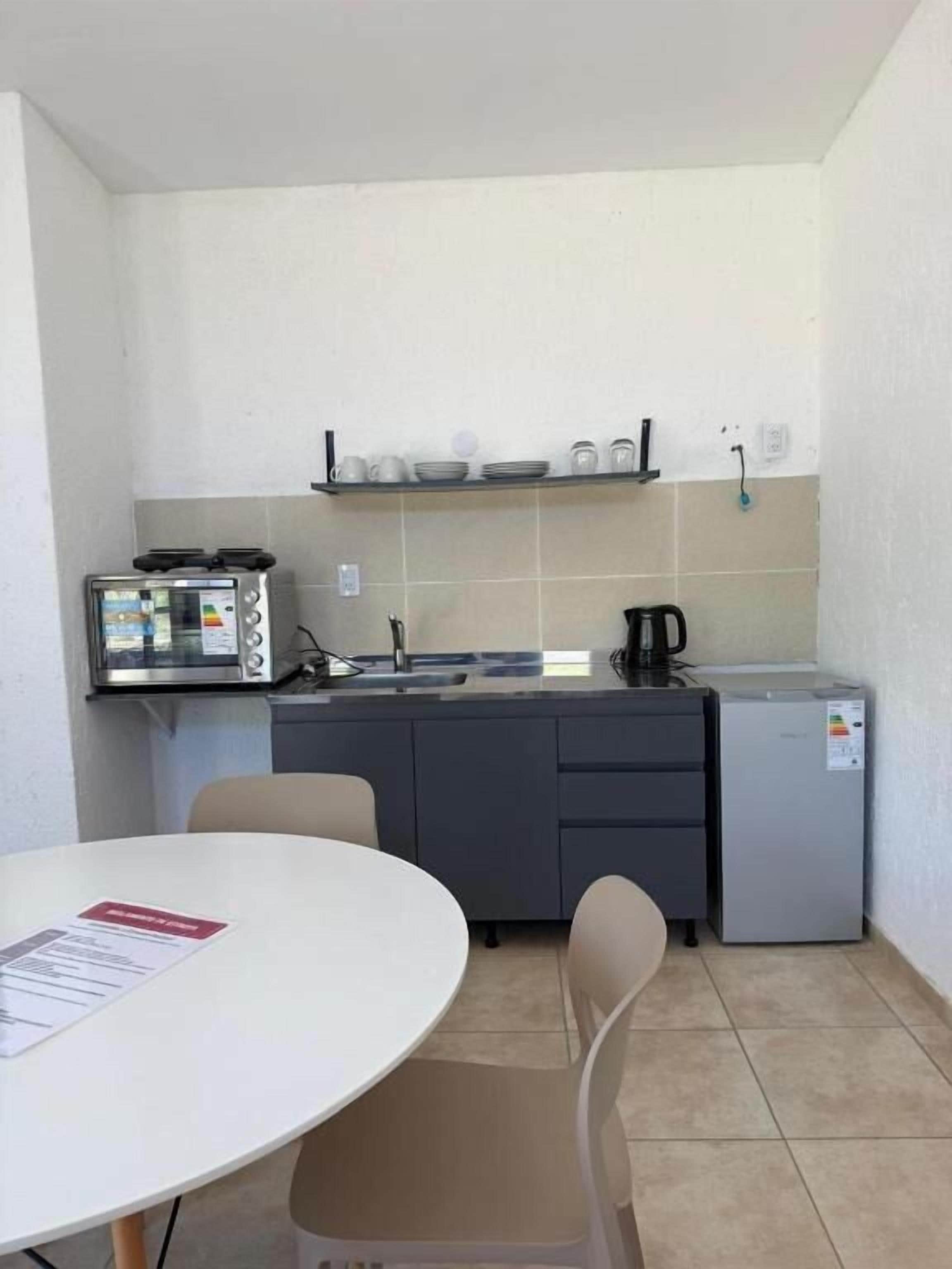Fridge, oven, cookware/dishes/utensils
