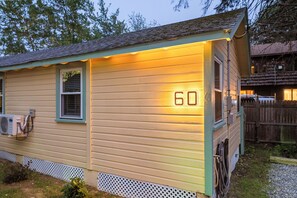 A single-story house with a number '60' displayed on the side. - Cabin 60 at Historic Sandy Point Resort W/ Boat Slip and Onsite Boat Ramp (Alton)