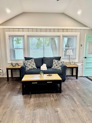 TV, fireplace - Cabin 59 at Historic Sandy Point Resort W/ Boat Slip and onsite Boat ramp (Alton)