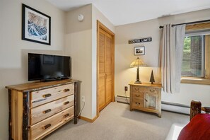 Everything Within Easy Reach - A TV, dresser, closet, and bedside table give you plenty of space to unpack and settle in during your stay. - Come Stay, Relax and Explore B8 (Killington)