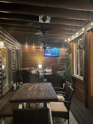 Dining - Cabin retreat featuring vaulted ceilings and a covered deck with stone fireplace (Overgaard)