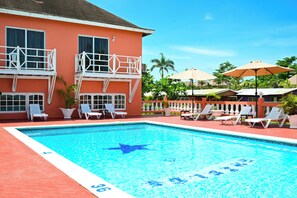 Outdoor pool - Cozy One-Bedroom Kitchenette within a Beachfront Property in the Famous Negril. (Negril)