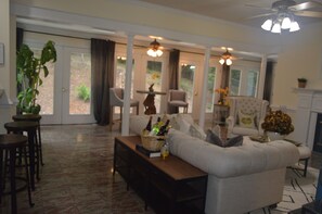 A living room with a sofa, chairs, a coffee table, and a fireplace. - Mountain-Top HOUSE with a Pool, Near Potomac River Beach! in serene Stafford (Stafford)