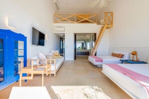 Ein modernes Schlafzimmer mit Schlafbox, Schreibtisch und Wendeltreppe.