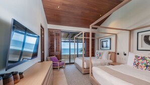 A modern bedroom with a large bed, a desk, and a view of the ocean. - Ph Bugambilia 4BD - Tau Punta Mita (Punta de Mita)