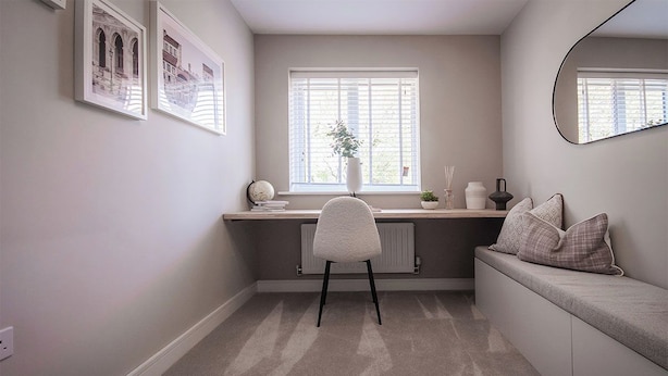 A study room with a desk, chair, radiator, and a bench with cushions. - House - Sleeps 6 - Parking - Garden (Newcastle)