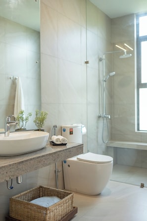 A modern bathroom with a large sink, toilet, and shower. - Starlit A Luxury Hilltop Villa with Infinity Pool (Weligama)