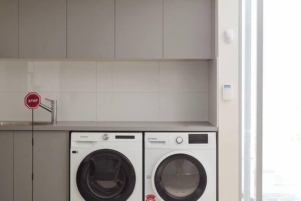 Take advantage of the private laundry, equipped with washer and dryer for hassle-free extended stays.