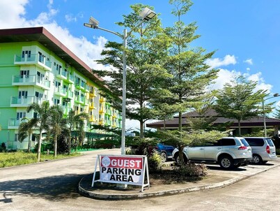Relax and Wake up in a cozy one bedroom condo with a view here in Naga City!