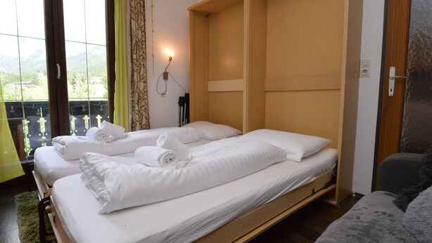 Room - Cozy apartment, opposite the ski lift. (Hinterthal - Maria-alm)