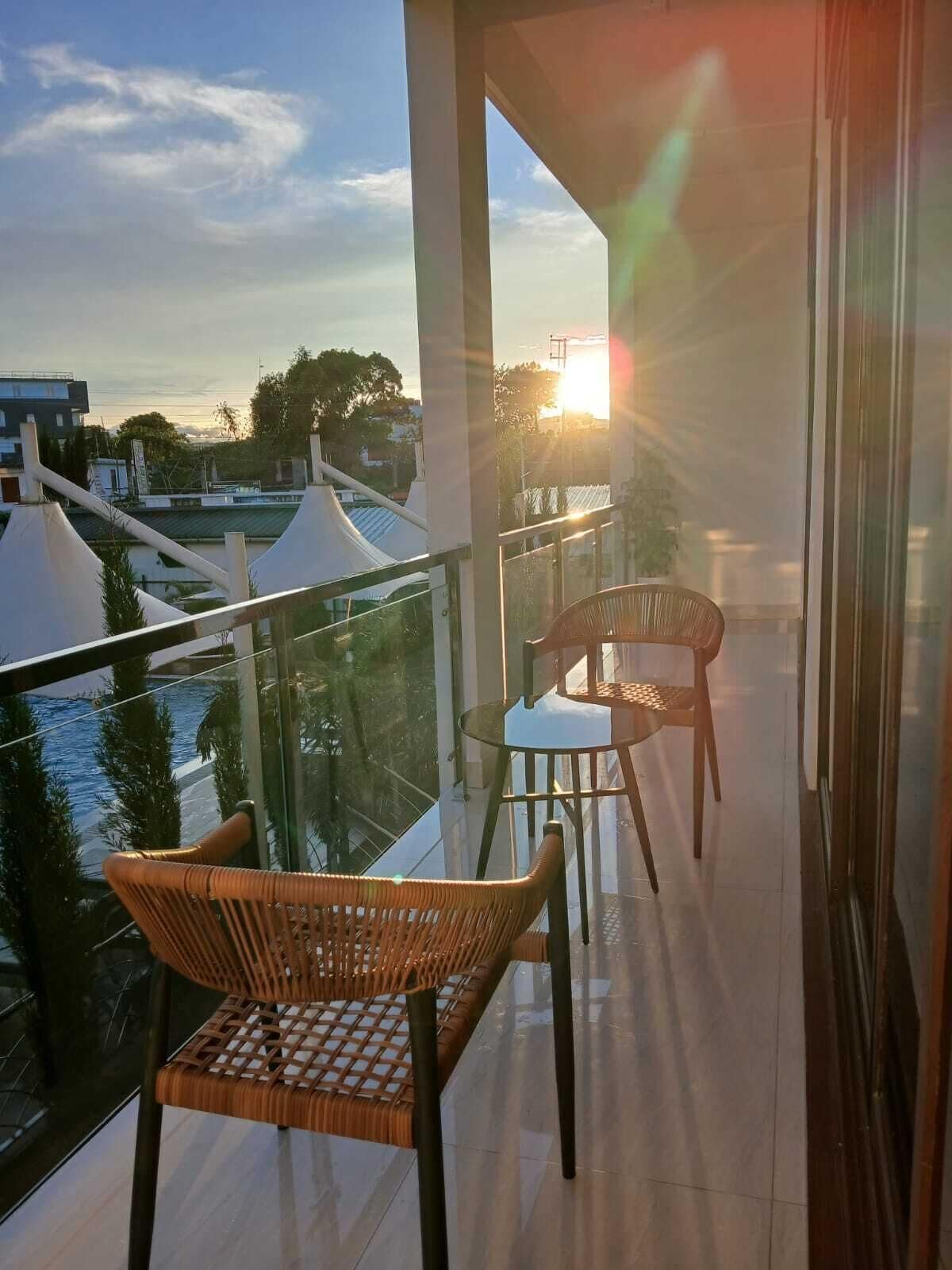 Grand Suite, Balcony, Pool View | Property grounds