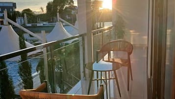 Grand Suite, Balcony, Pool View | Property grounds