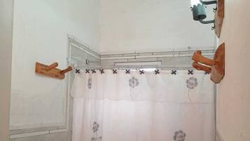 Shower, bidet, towels, soap