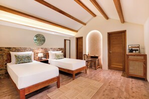 A bedroom with two beds, a desk, a chair, and a cabinet. - The Safari Lodge Kanha  (Baihar)