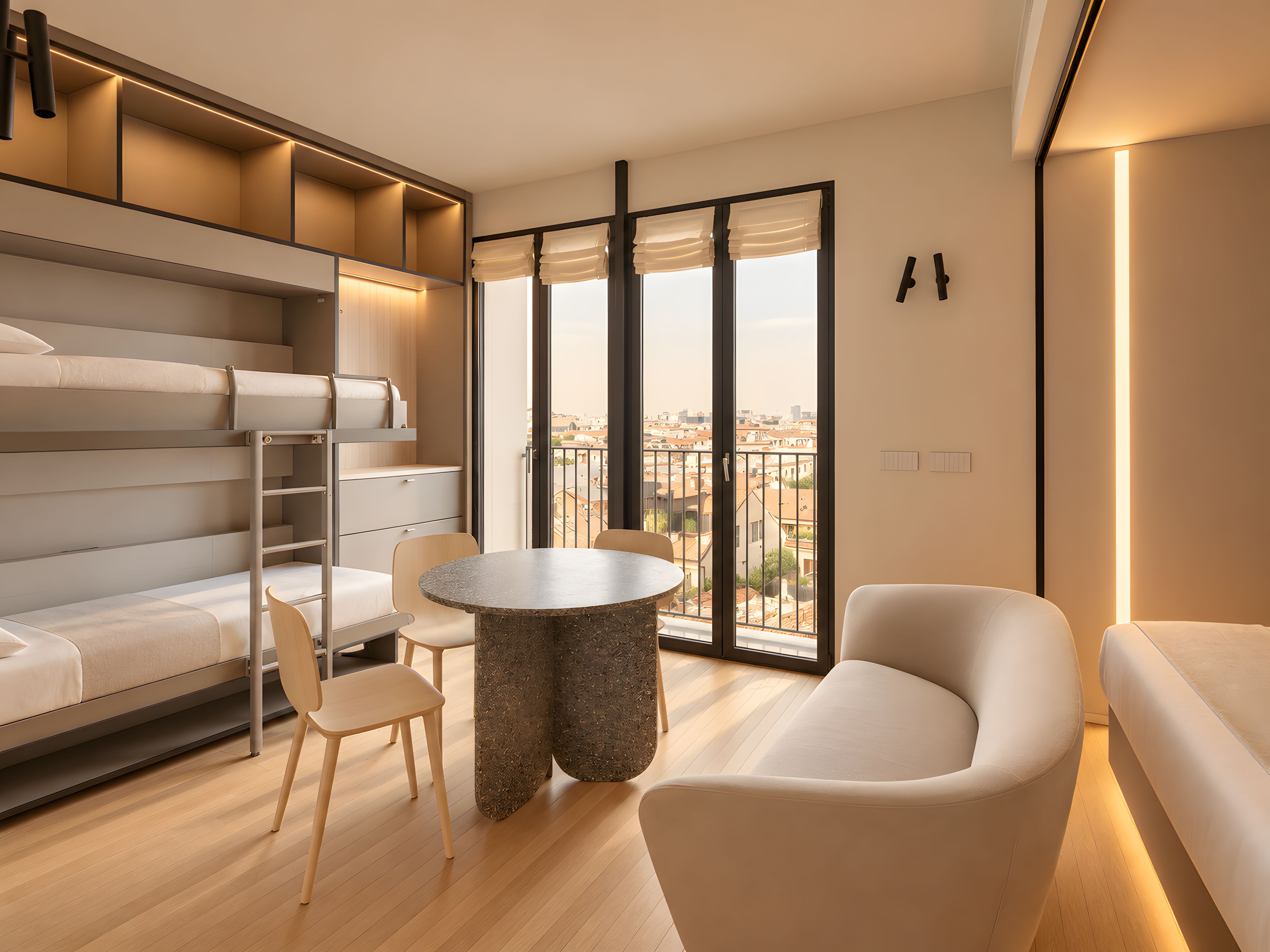 A modern bedroom with a bunk bed, a round dining table, and a sofa.