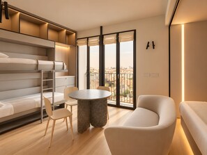 A modern bedroom with a bunk bed, a round dining table, and a sofa. - 7 R House (Milano)