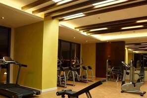 A gym with treadmills, elliptical machines, and weight equipment. - Bay View (City of Manila)
