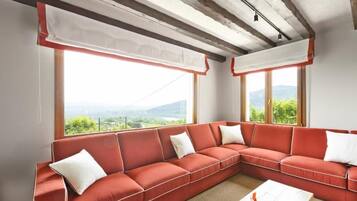 Deluxe Apartment, Vineyard View | Living area | 50-inch LED TV with digital channels